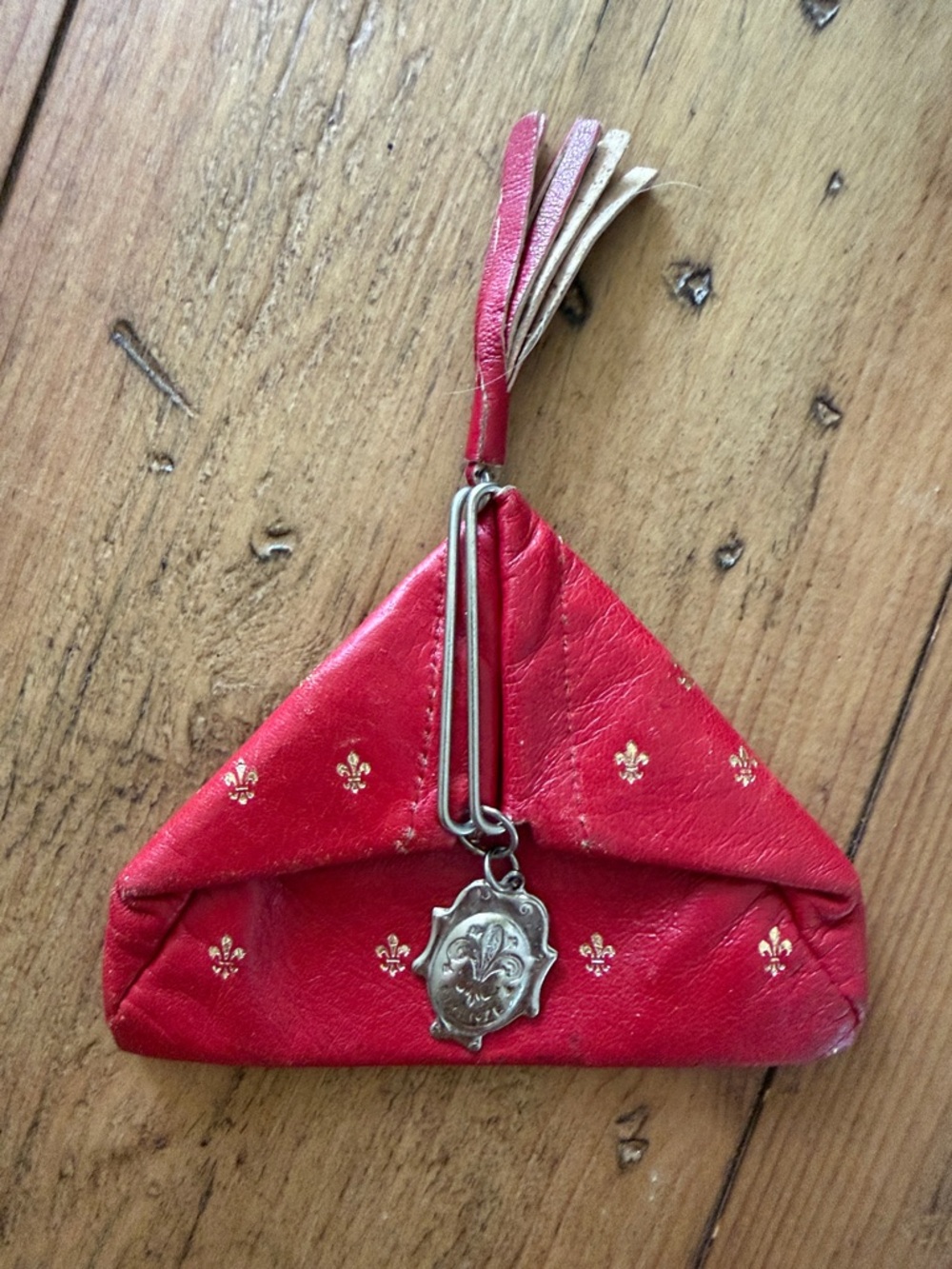 Red Leather Triangle Clutch with Tassel and Medallion